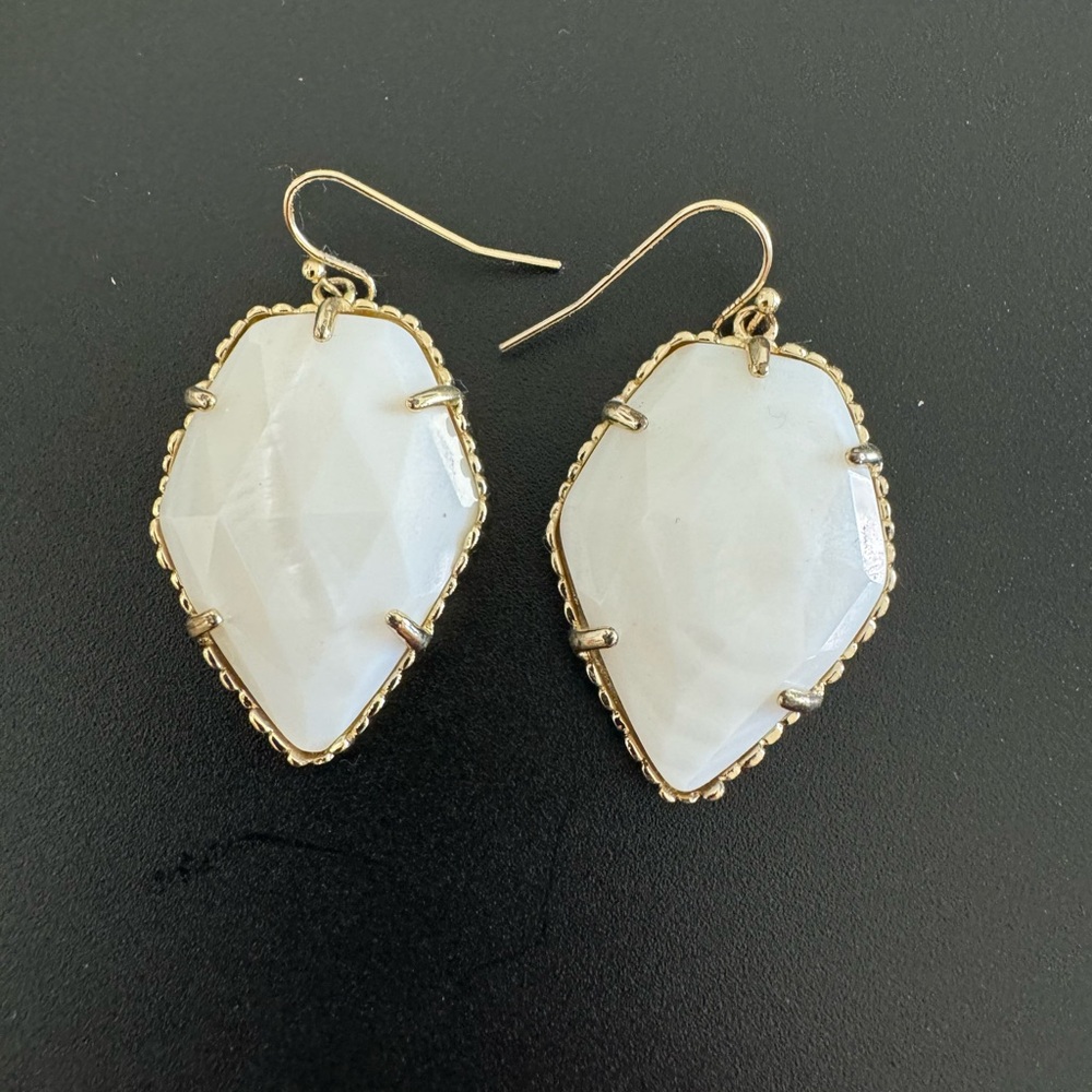 Kendra Scott white with gold ( i believe it’s called mother of pearl)